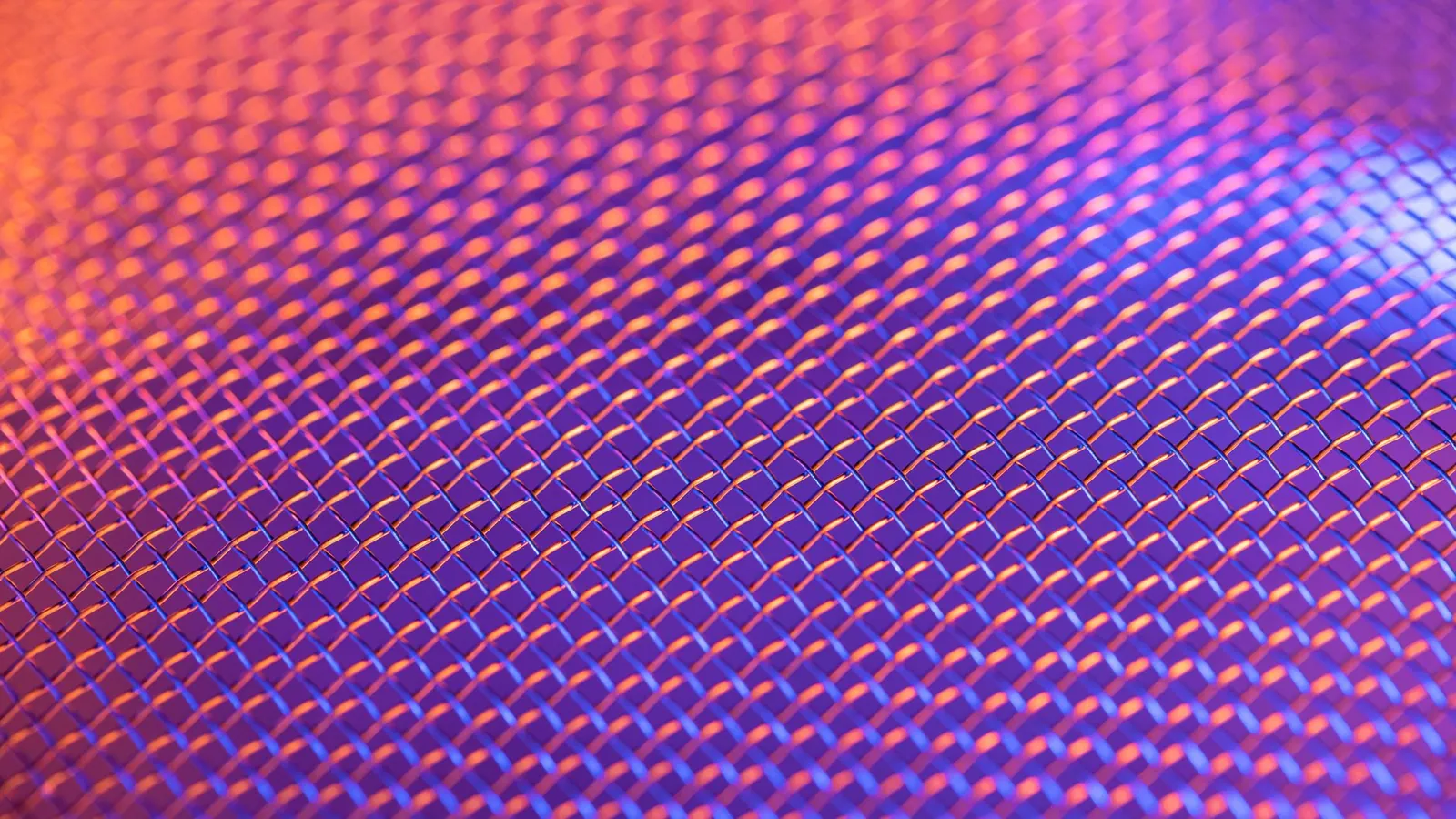 Retro synthwave neon grid stretching to the horizon